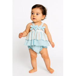 El conjunto ideal para tu pequeña. Diseño dulce en rayas y lazo azul. Perfecto para regalar o lucir en ocasiones especiales.